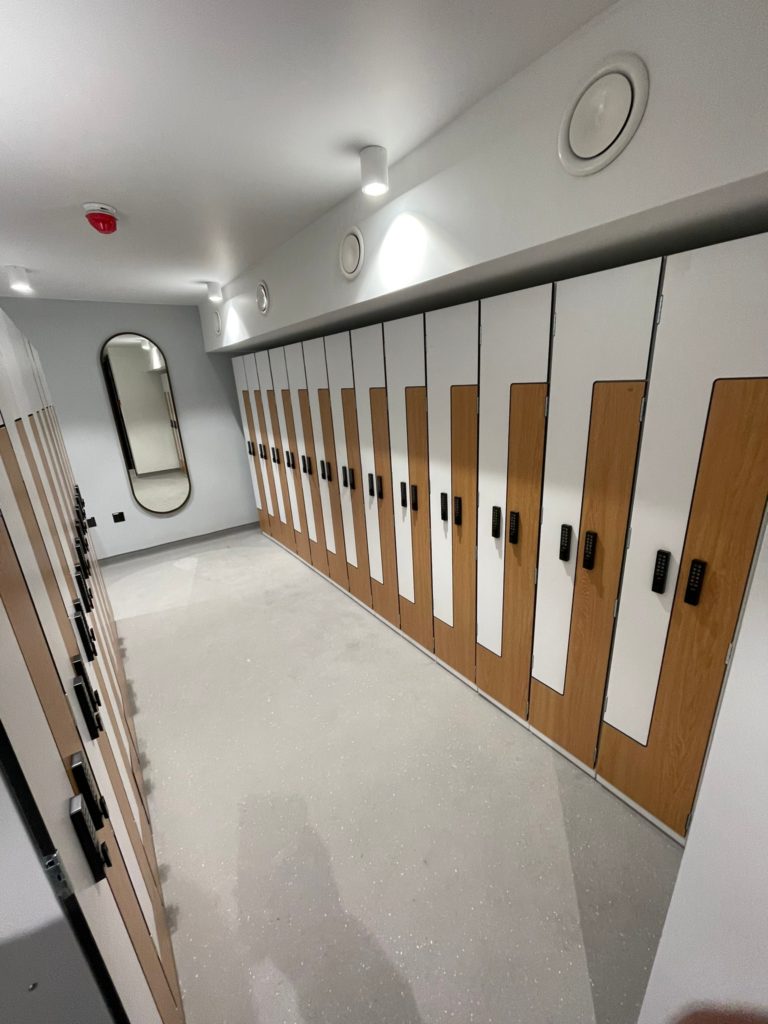 white and wood laminate lockers